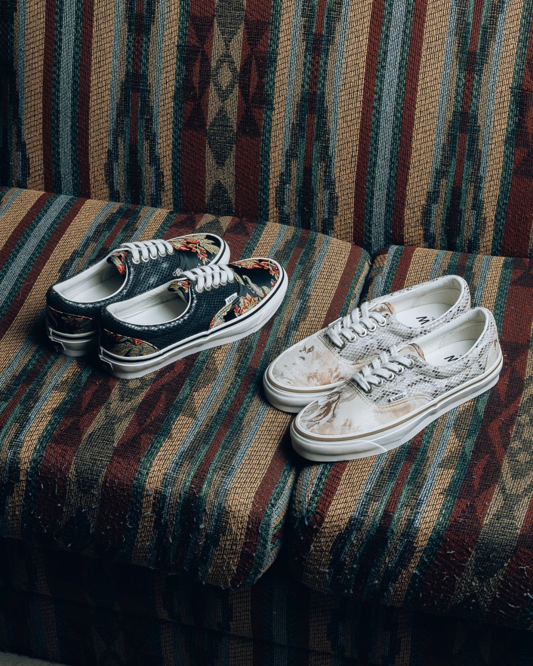 Vans OTW Era 95 Vibram Floral Black and Floral River Taupe pairs side by side on a woven blanket, photo via Fullress