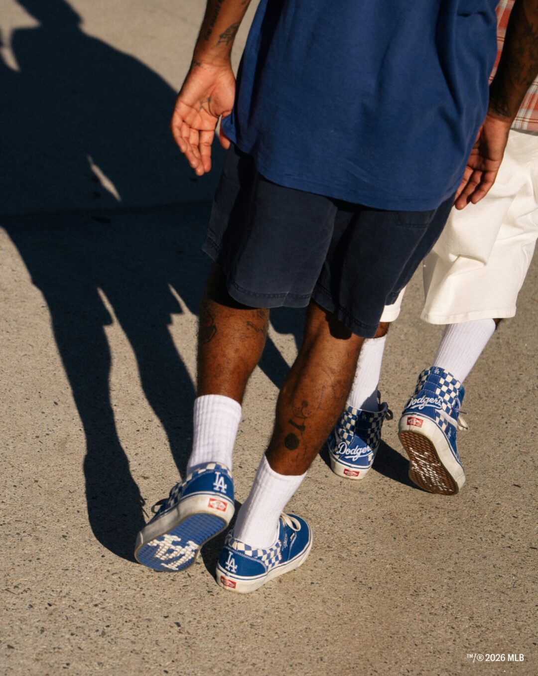 Vans × Los Angeles Dodgers Sk8-Hi and Skate Era — on-foot campaign walk in Dodger Blue checkerboard