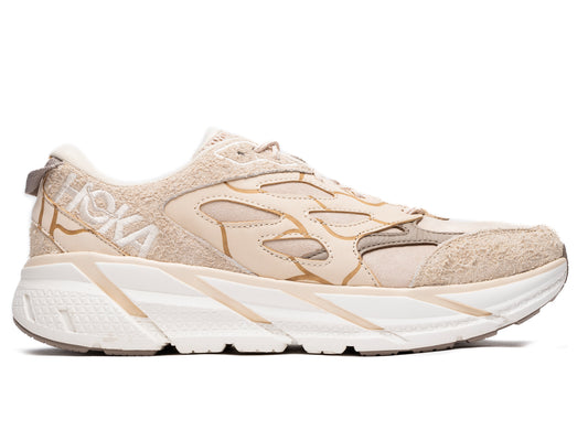 Hoka Elite Terrain System Clifton L Suede unisex en color roble