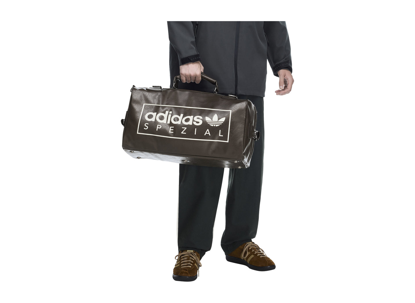Adidas Standish SPZL Bag in Dark Brown — on model handheld