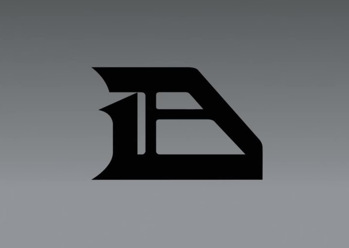 Darius Acuff Jr.'s new Reebok signature logo, a black A-and-D initials mark on a grey background. Image via Sole Retriever