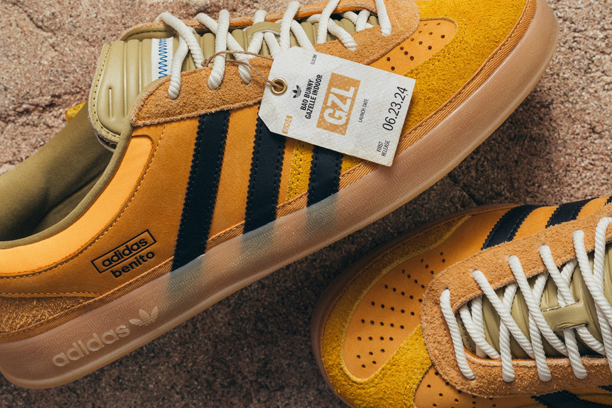 Bad Bunny x adidas Gazelle Indoor Solar Gold KI2592 with benito lettering and First Release hang tag, photo via Sneaker Freaker