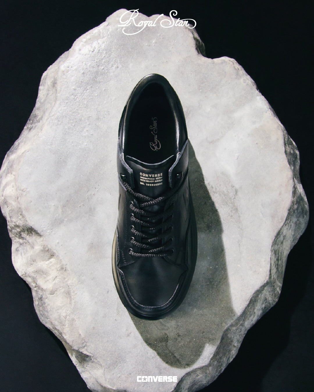 Converse ROYAL STAR WP LOW in black leather on a raw stone slab — official Converse imagery via Fullress