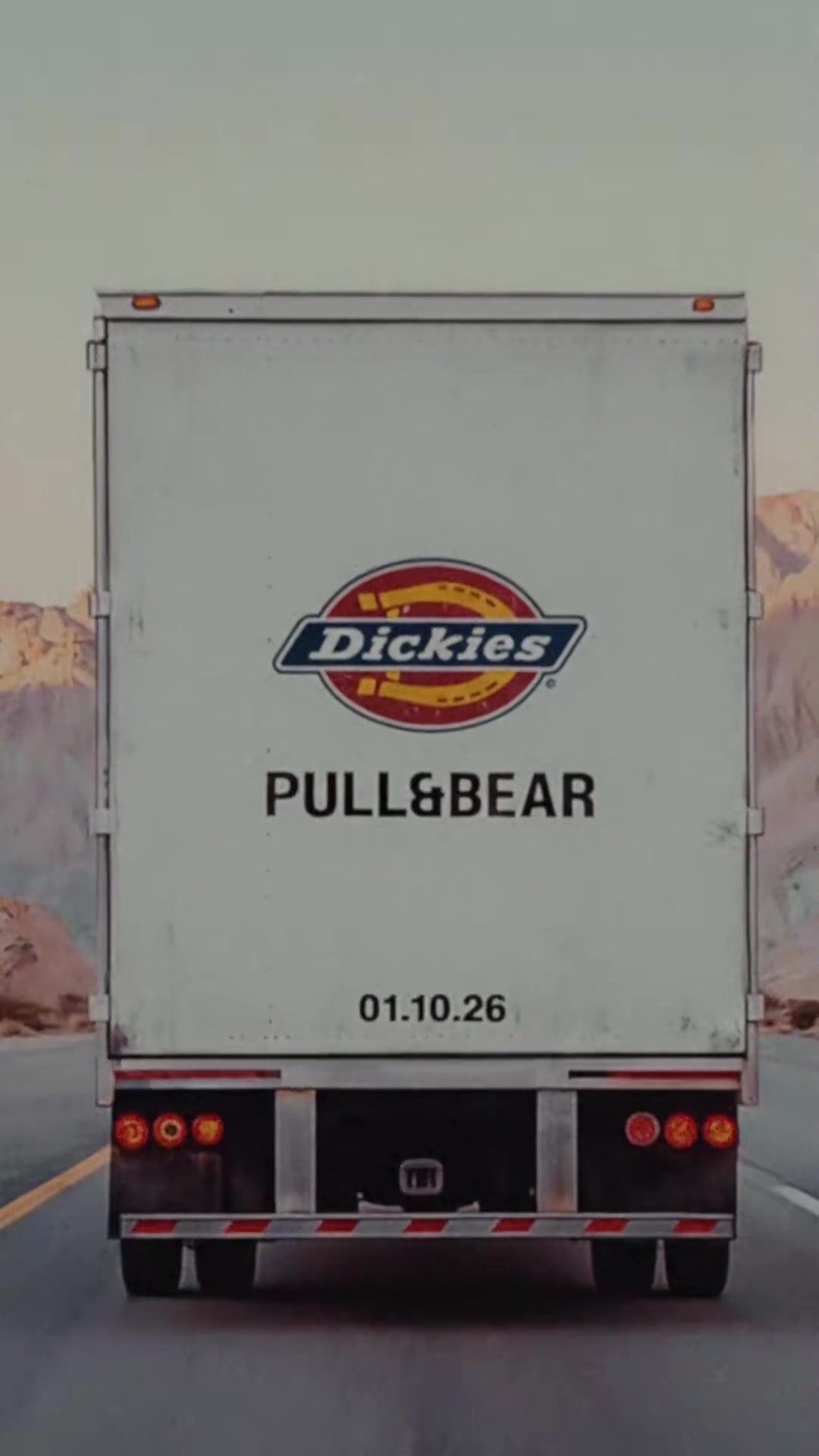 Dickies × Pull&Bear campaign teaser — trailer on desert highway marked Dickies / Pull&Bear / 01.10.26 — official @pullandbear video still