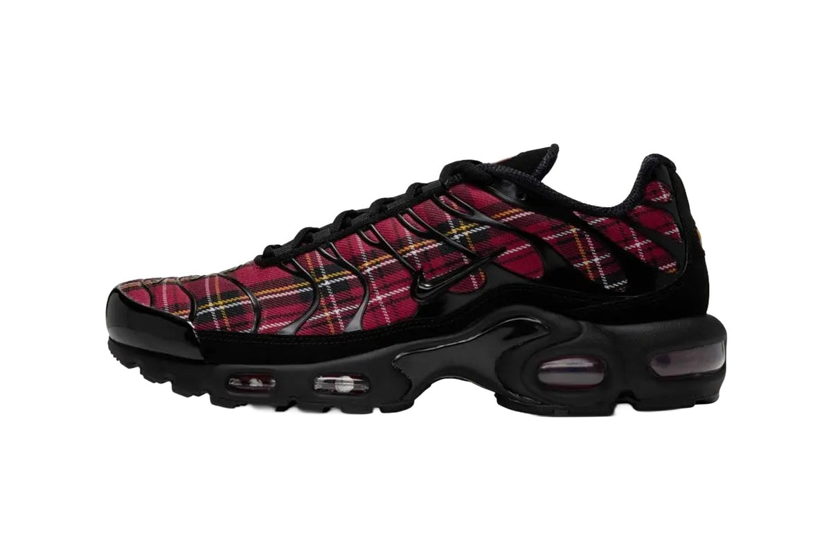 Nike Air Max Plus "Plaid Pack" in Tough Red tartan with a black TPU cage and black Air unit, lateral side. Official image via Hypebeast