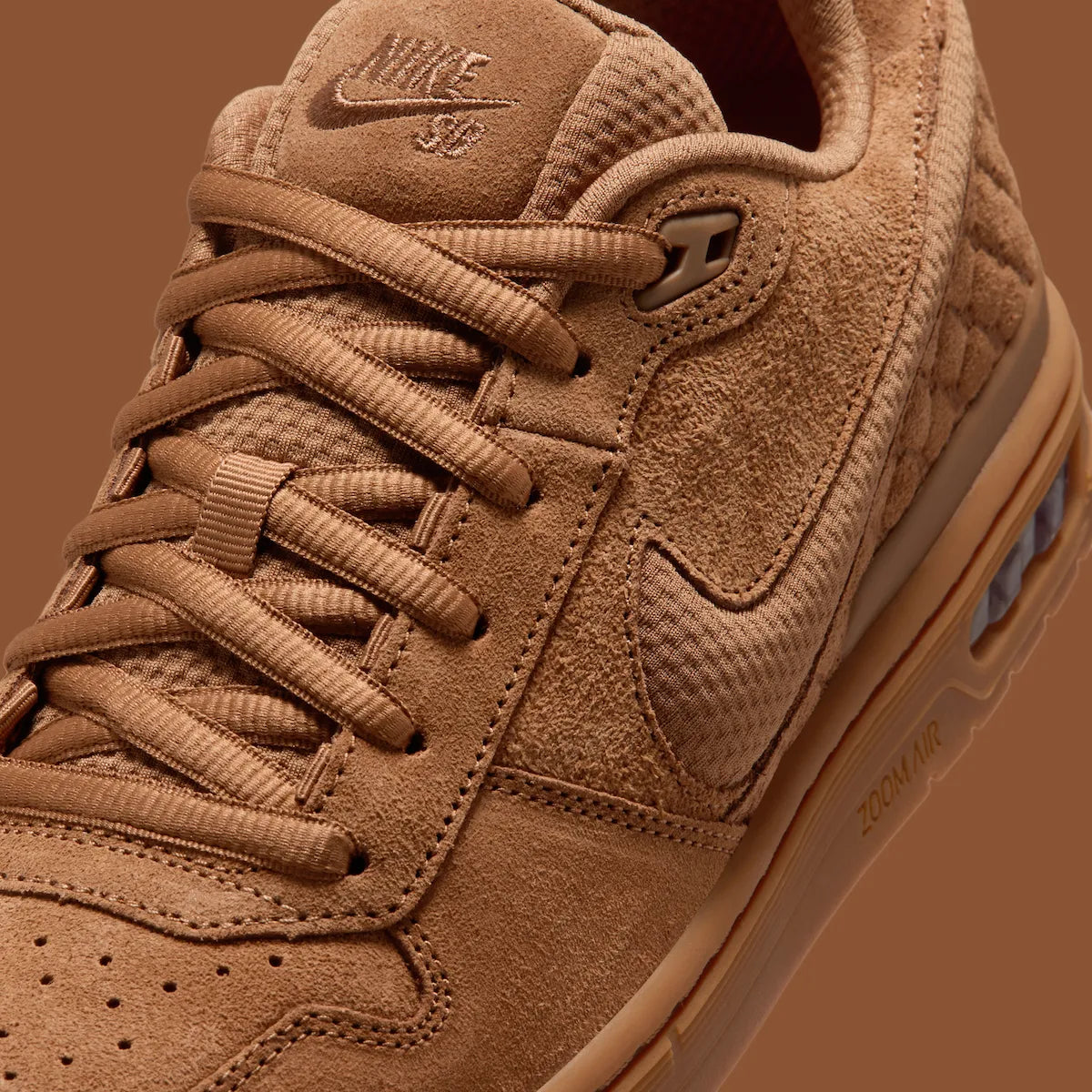 Close-up of the Nike SB P-Rod 1 Zoom Air Low Ale Brown IQ6827-200 in tonal brown suede with quilted heel and Nike SB tongue logo