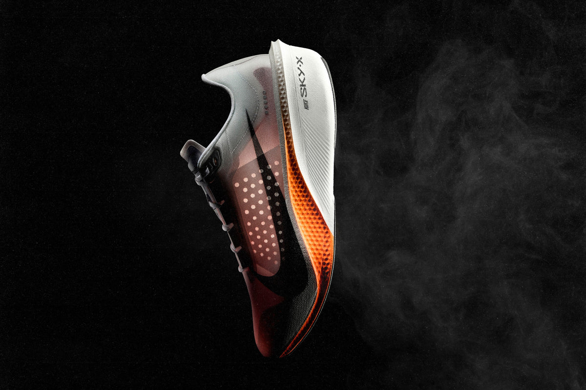 Nike Swooshfly race-day super shoe floating in atmospheric smoke — official Nike newsroom campaign