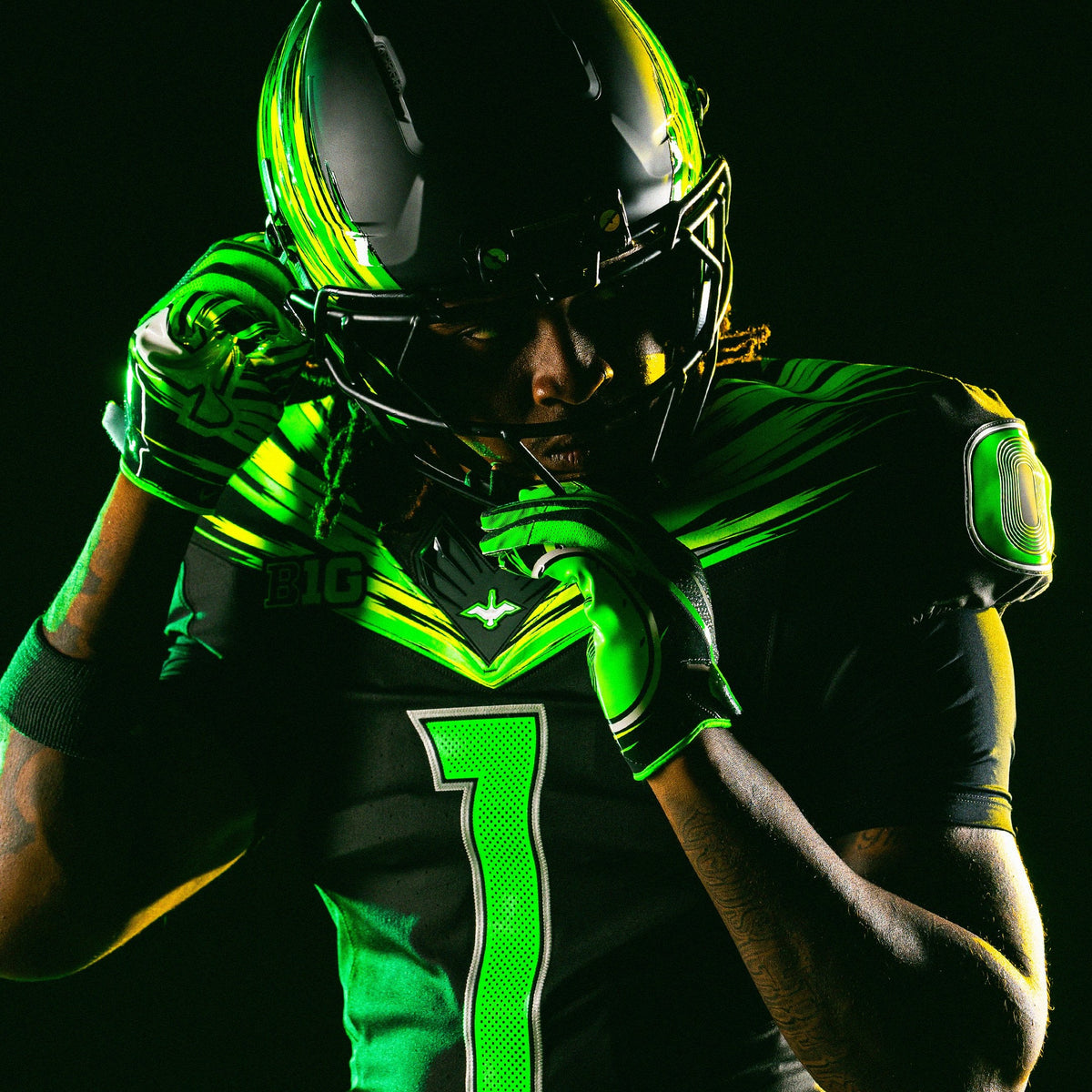 Oregon Ducks Origin of Speed Nike uniform — player in Night Forest and Green Strike kit