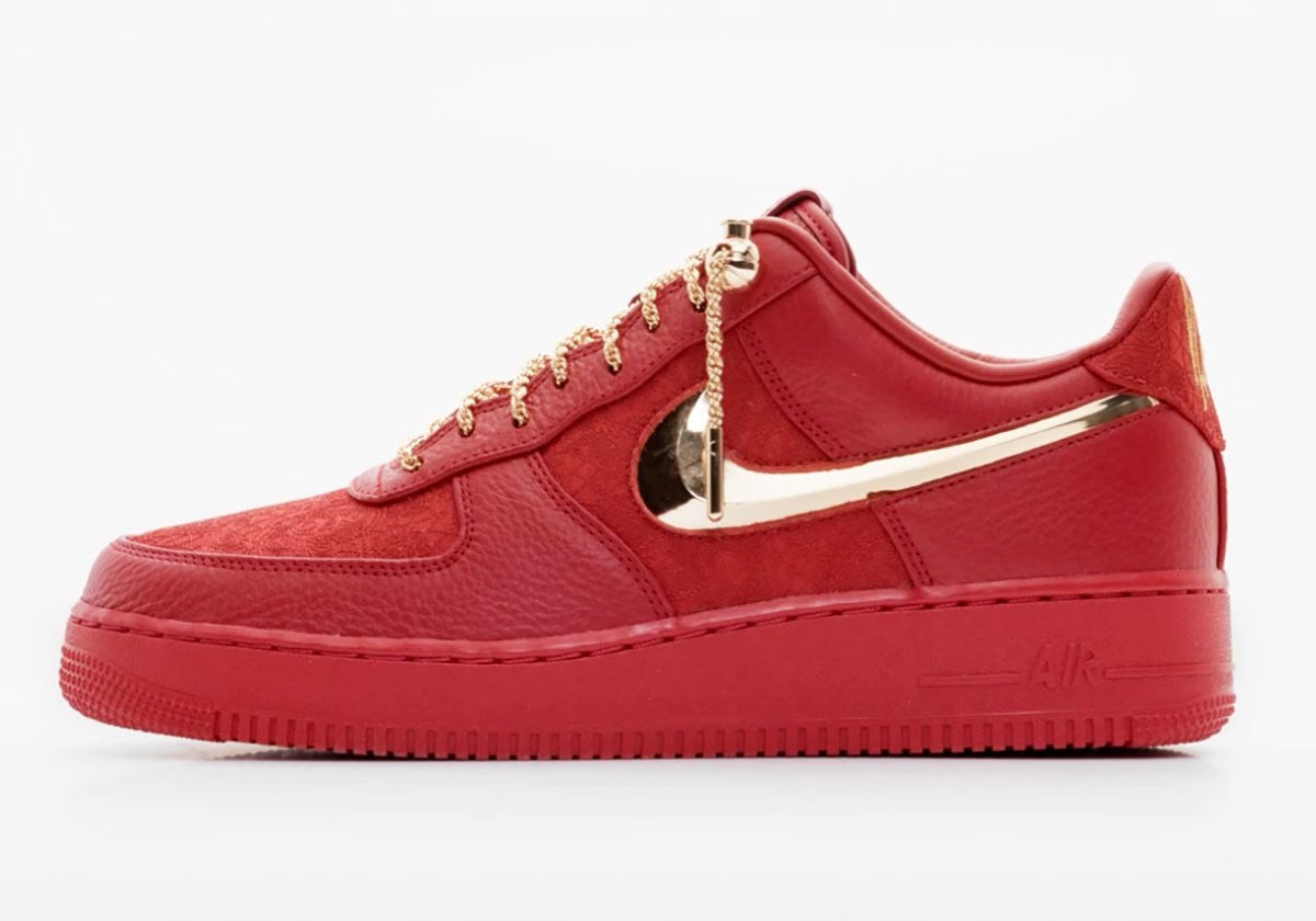 Victor Solomon x Nike Air Force 1 Low in Gym Red with a gold-plated Swoosh. Photo via Sneaker News
