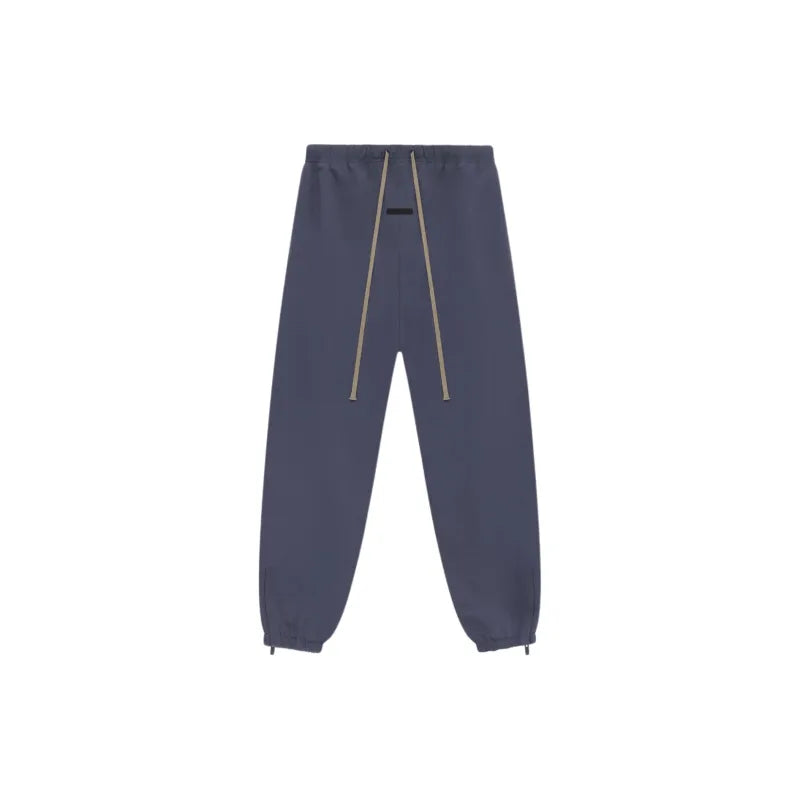 Pantalones de chándal de nailon militar Fear of God Essentials en color Marine