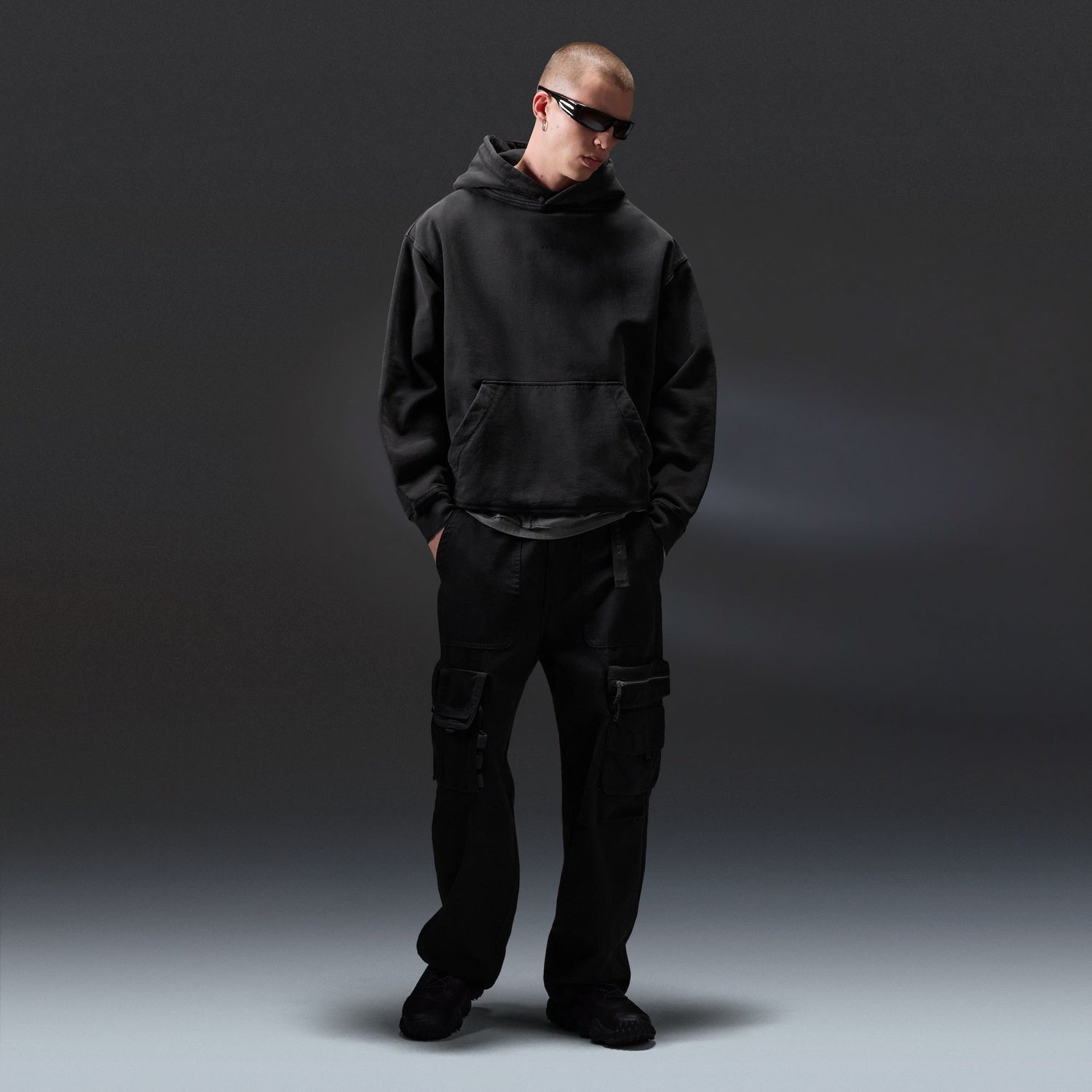 Oakley Echo Mod Embroidered Hoodie in Pitch Black, men's black hoodie on model, view 3