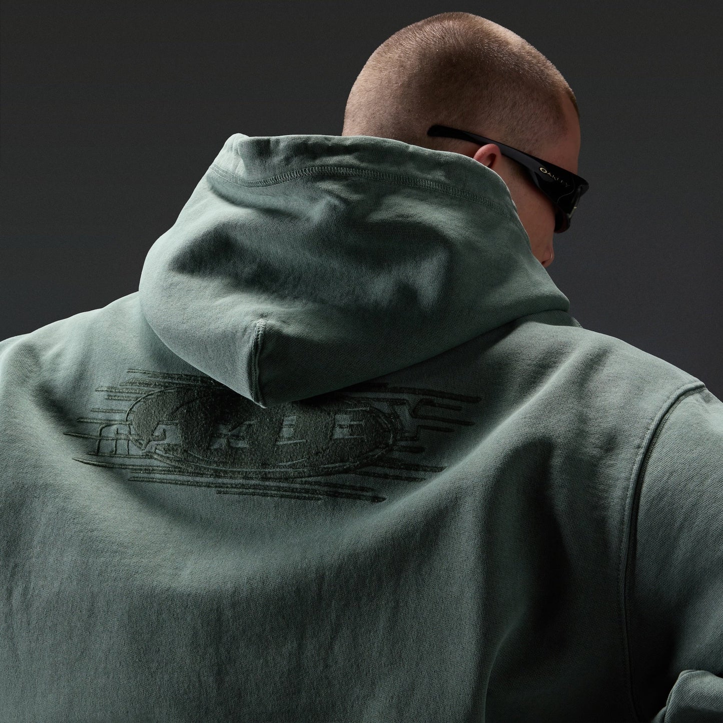 Oakley Echo Mod Embroidered Hoodie in Aviator Green, men's green hoodie on model, view 6