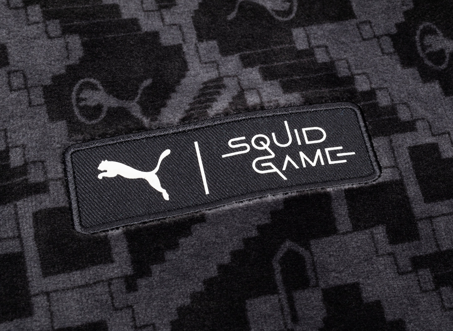 Chaqueta deportiva icónica T7 de Puma x Squid Game en negro