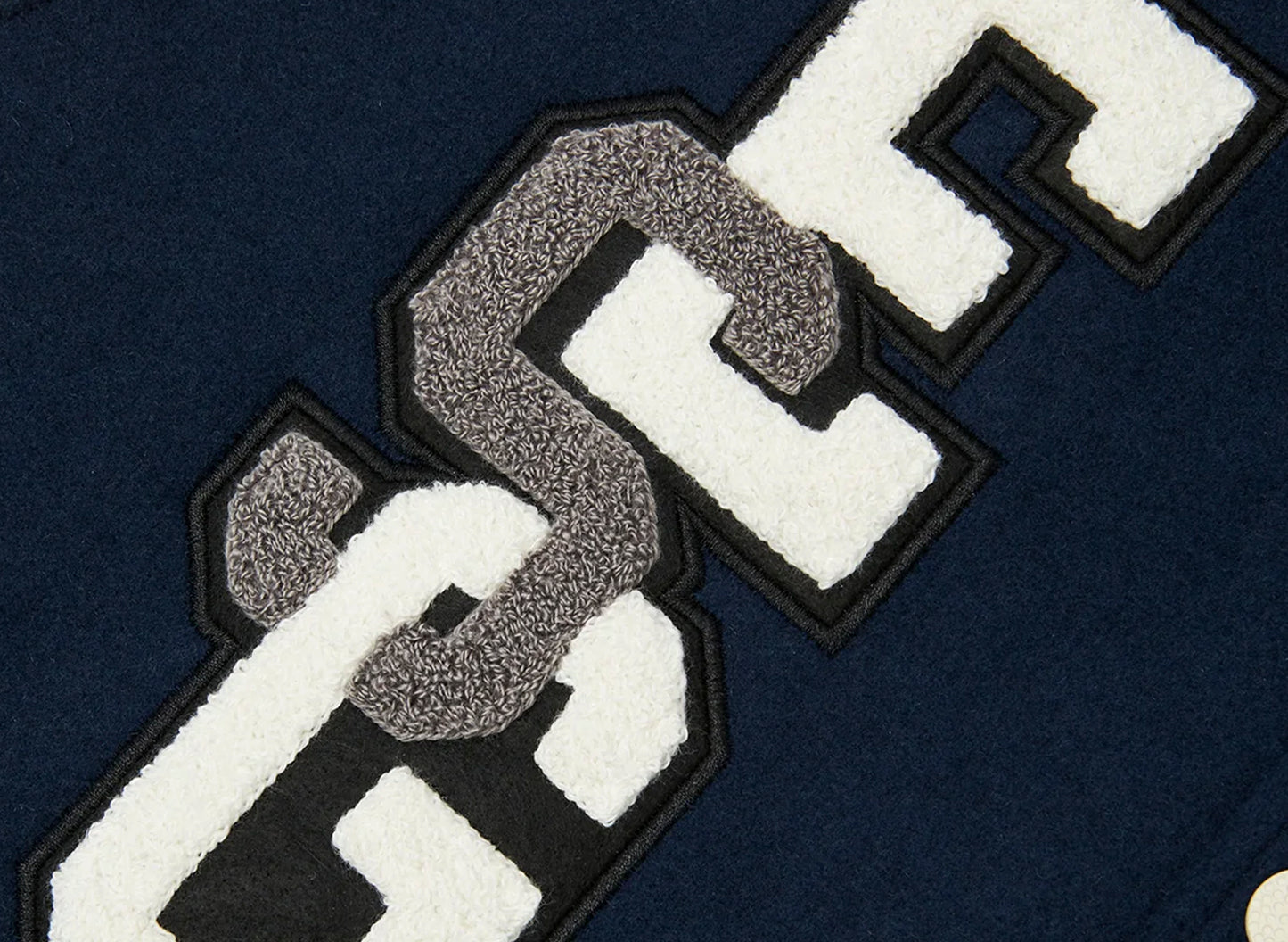 Chaqueta y bolsa Eastside Golf Varsity