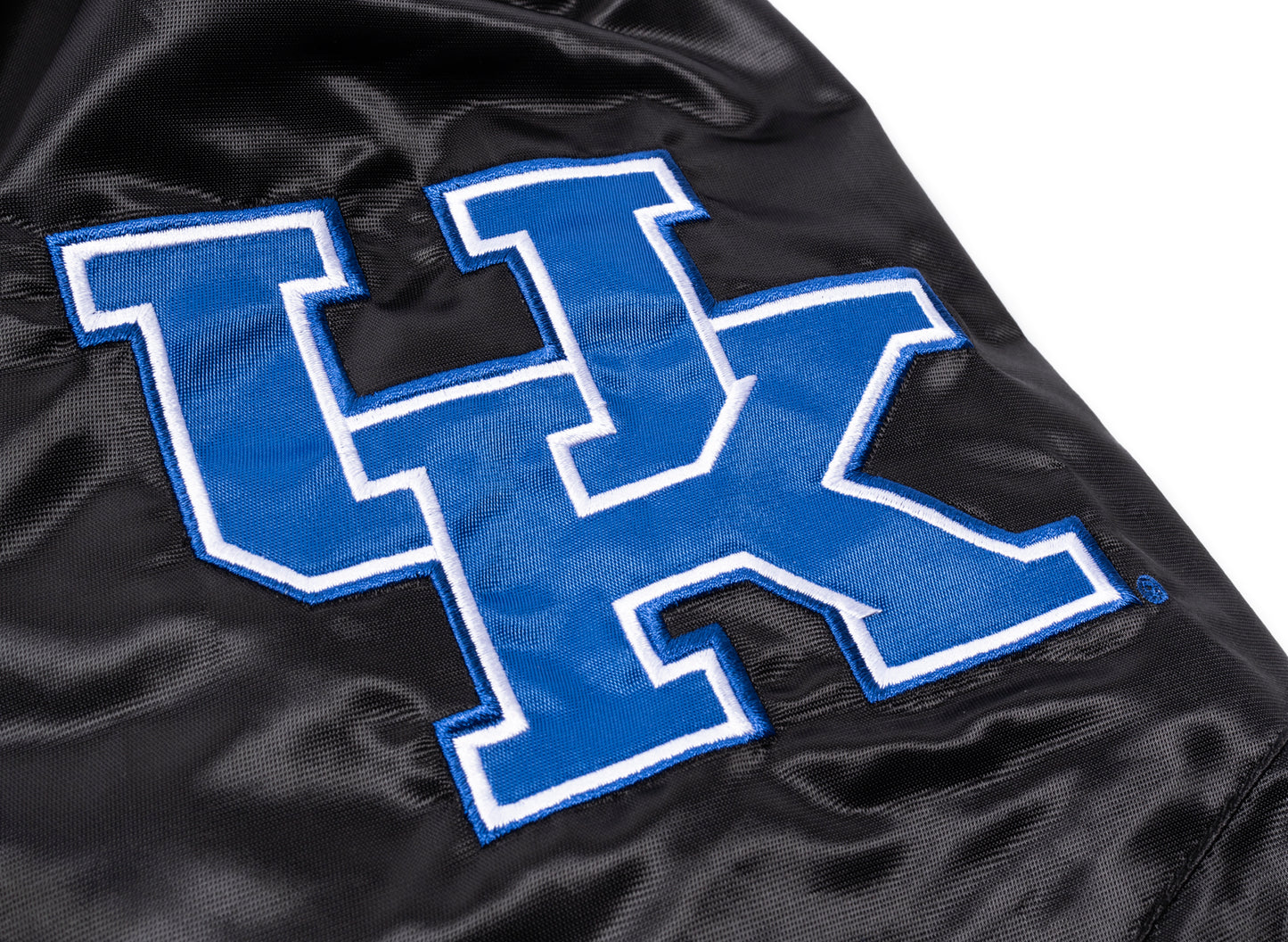 Chaqueta Starter Oneness exclusiva de los Kentucky Wildcats de polietileno en color negro