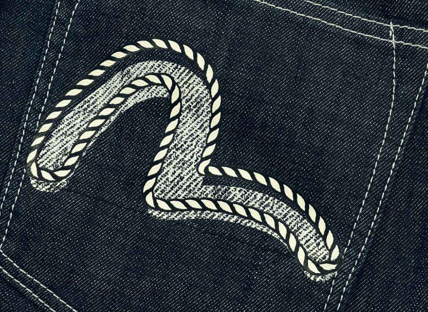 Vaqueros de mezclilla con estampado de gaviota y patrón de cuerda Evisu de corte zanahoria