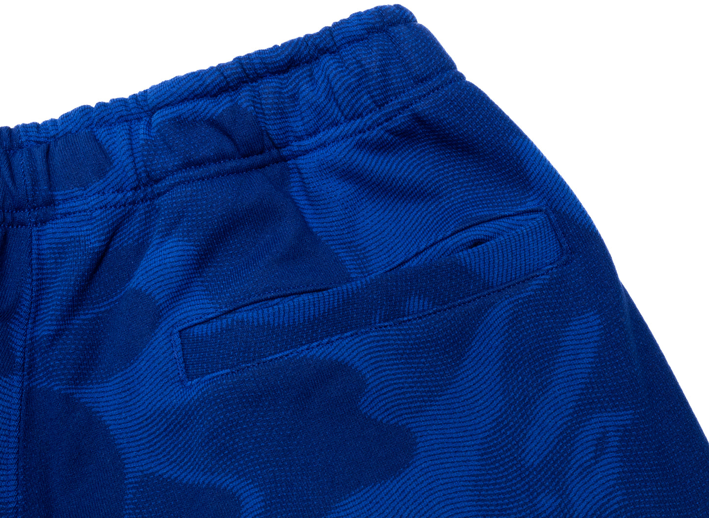 Pantalones de chándal anchos con botones y estampado de camuflaje de A Bathing Ape en azul