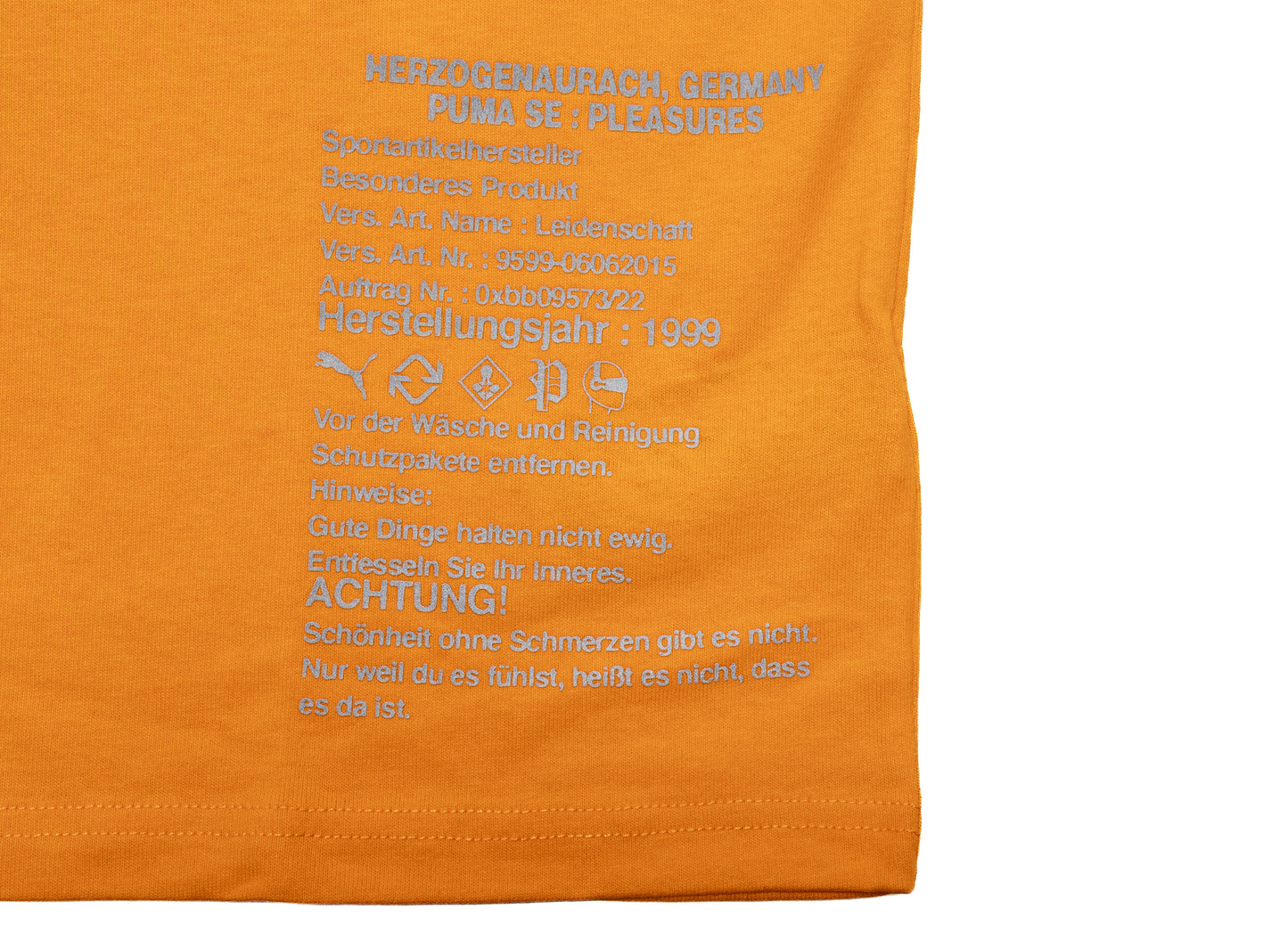 Puma x Pleasures Typo Tee in Orange - Damaged