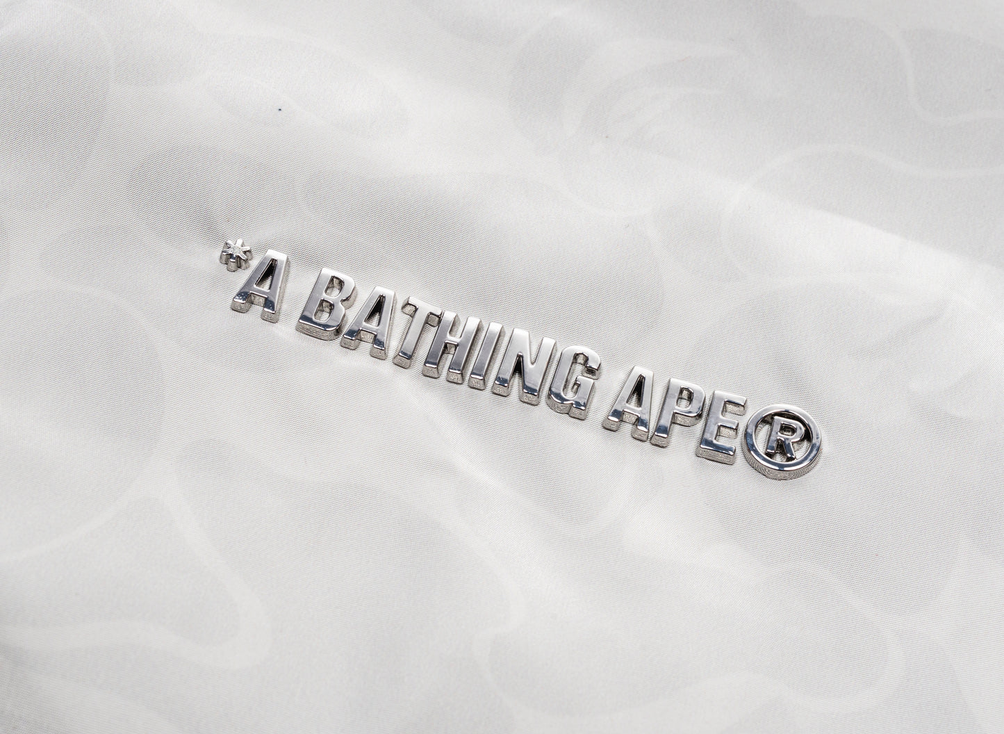 A Bathing Ape Solid Color Nylon Hooded Jacket in Grau