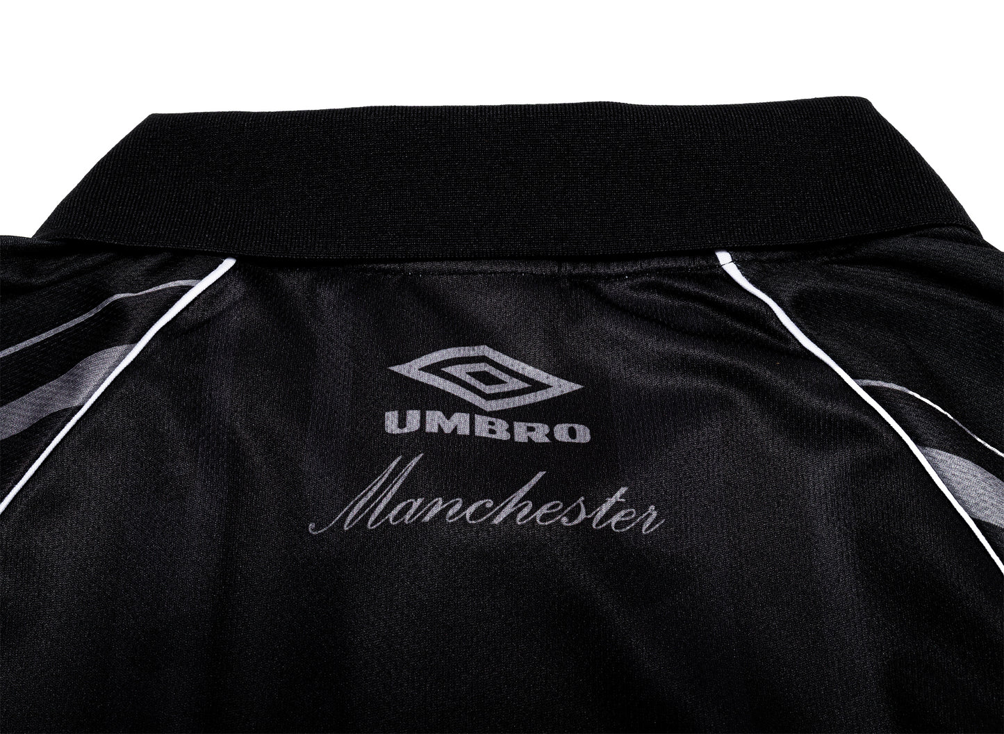 Umbro Distressed Spycam Polo in Lila / Schwarz