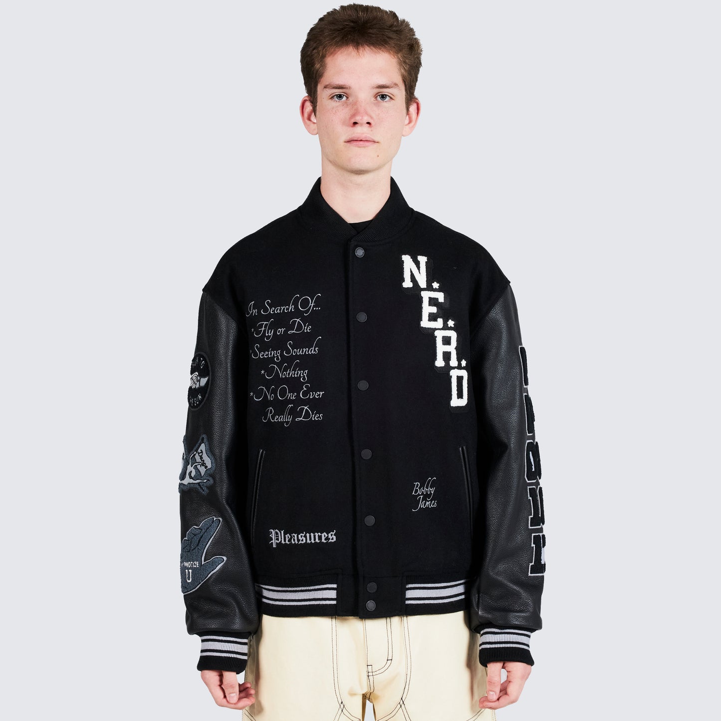 Chaqueta universitaria NERD de Pleasures en negro