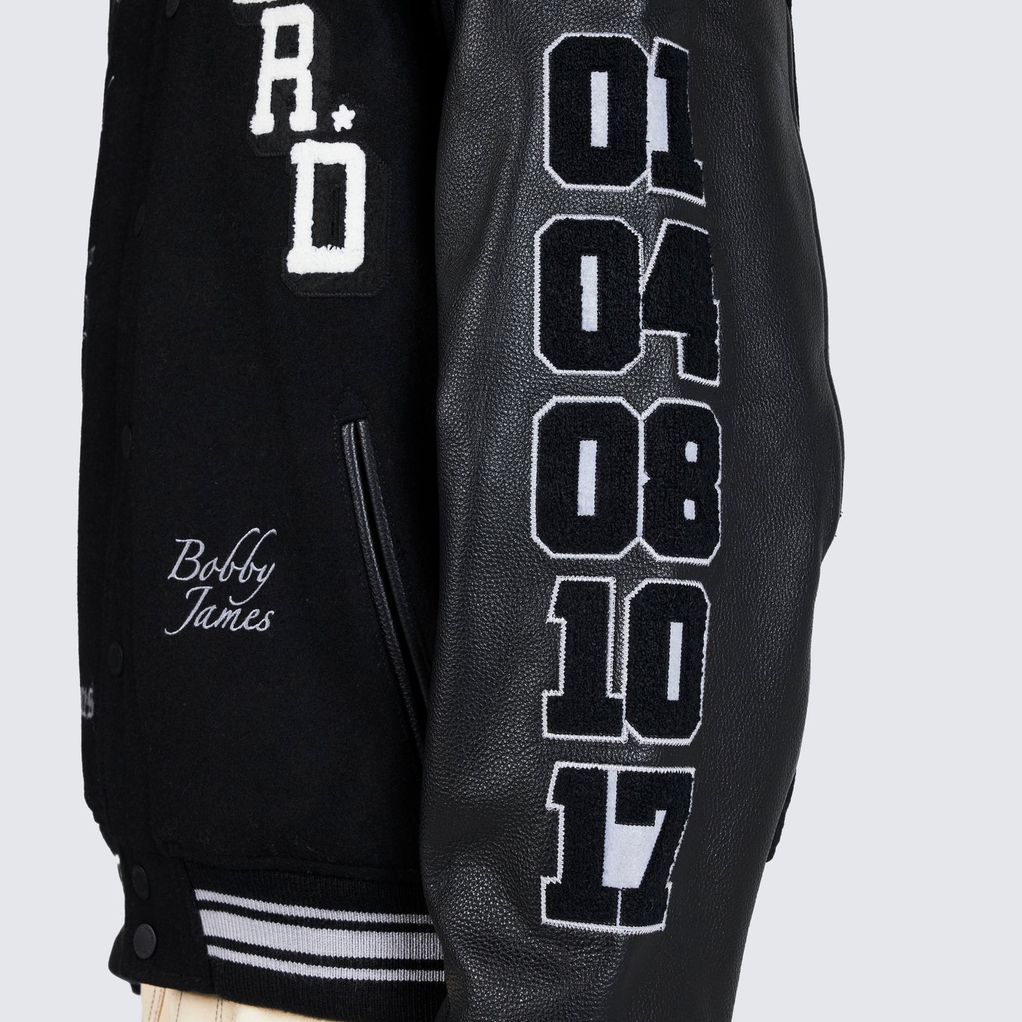 Chaqueta universitaria NERD de Pleasures en negro