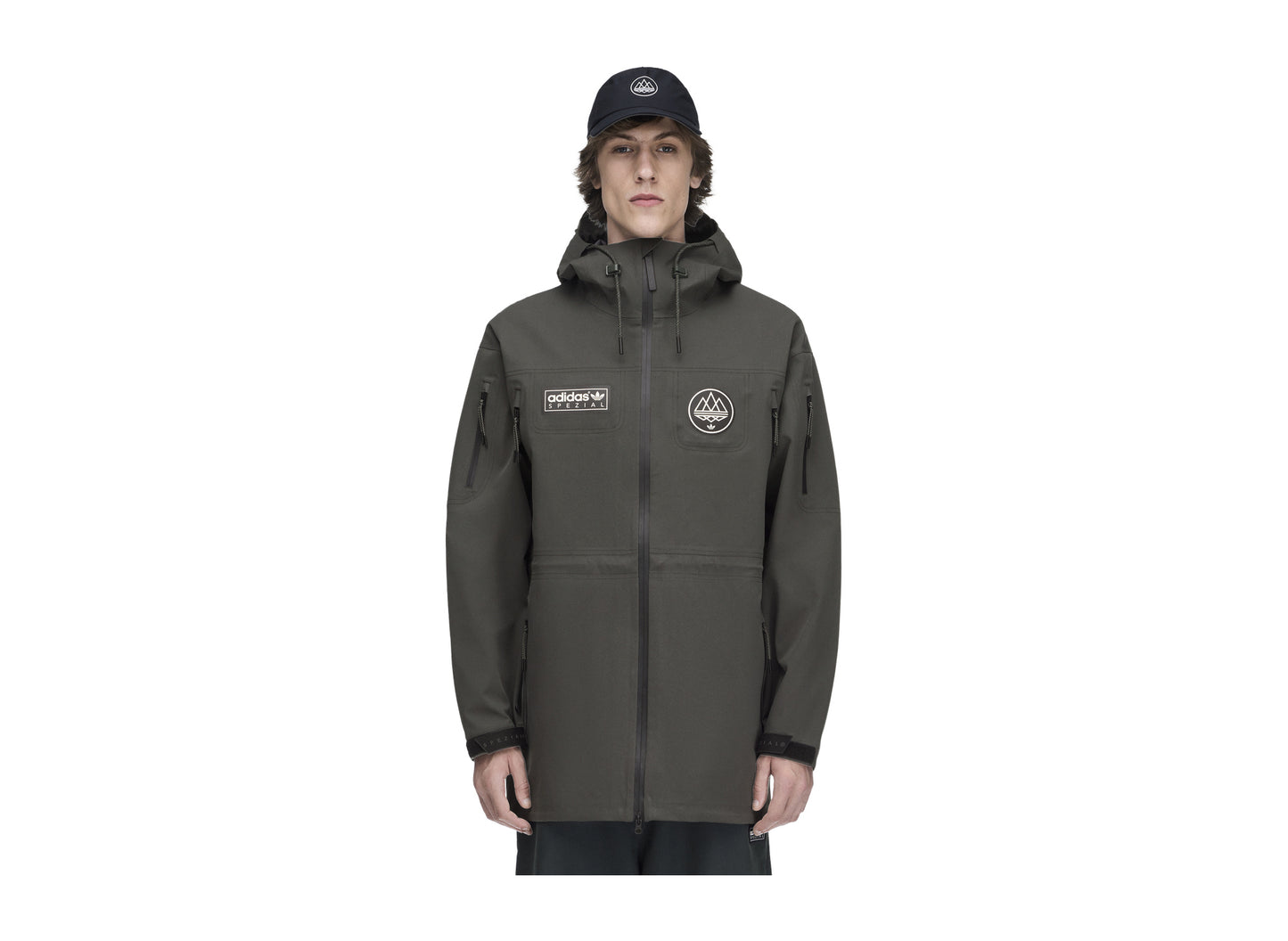 Adidas Springvale SPZL Parka in Legend Earth — on model front view