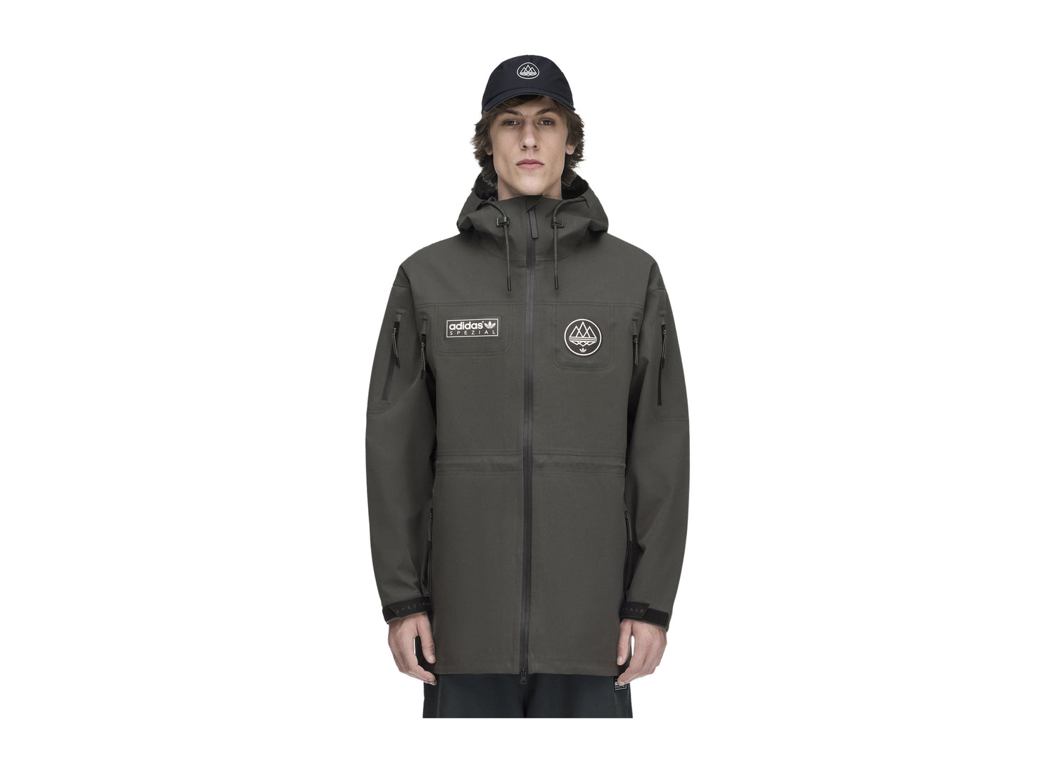 Adidas Springvale SPZL Parka in Legend Earth — on model front view