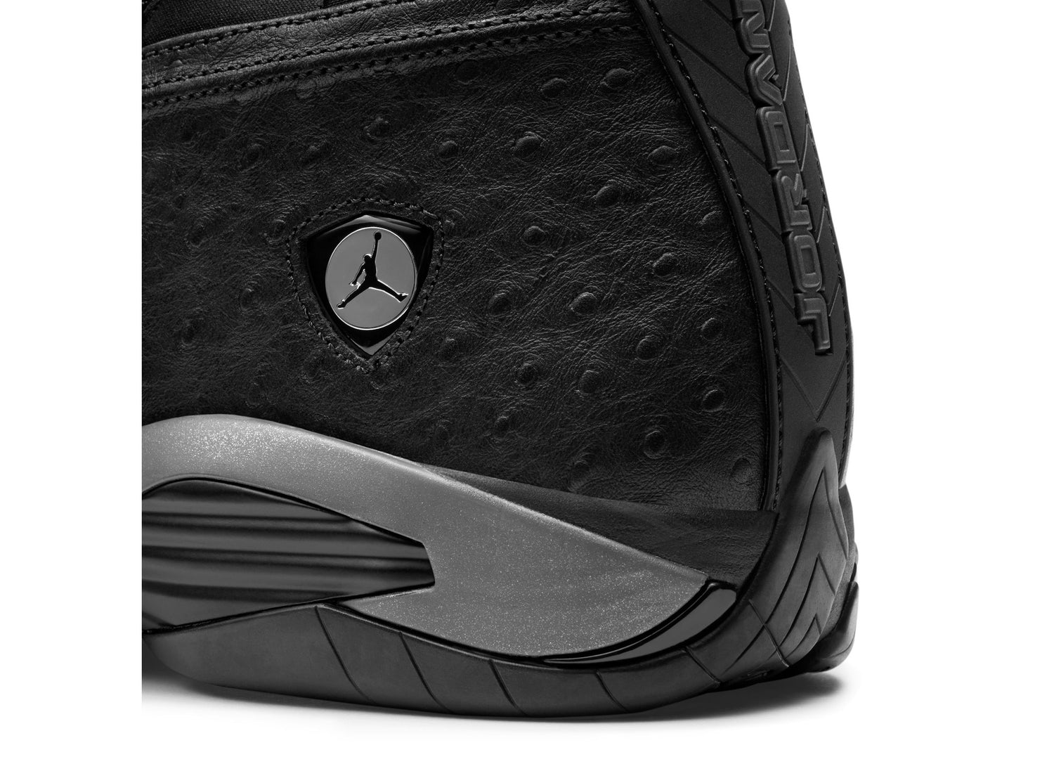 Air Jordan 14 Low OG SP Black Pack in Black / Off Noir — Jumpman badge and textured side detail