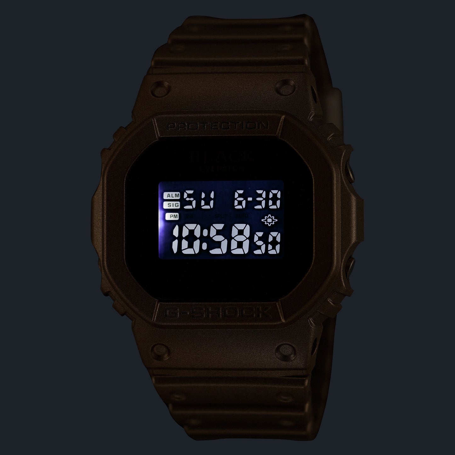Casio G-Shock x BlackEyePatch DW5600BEP-9 in Gold / Black — illuminated digital display