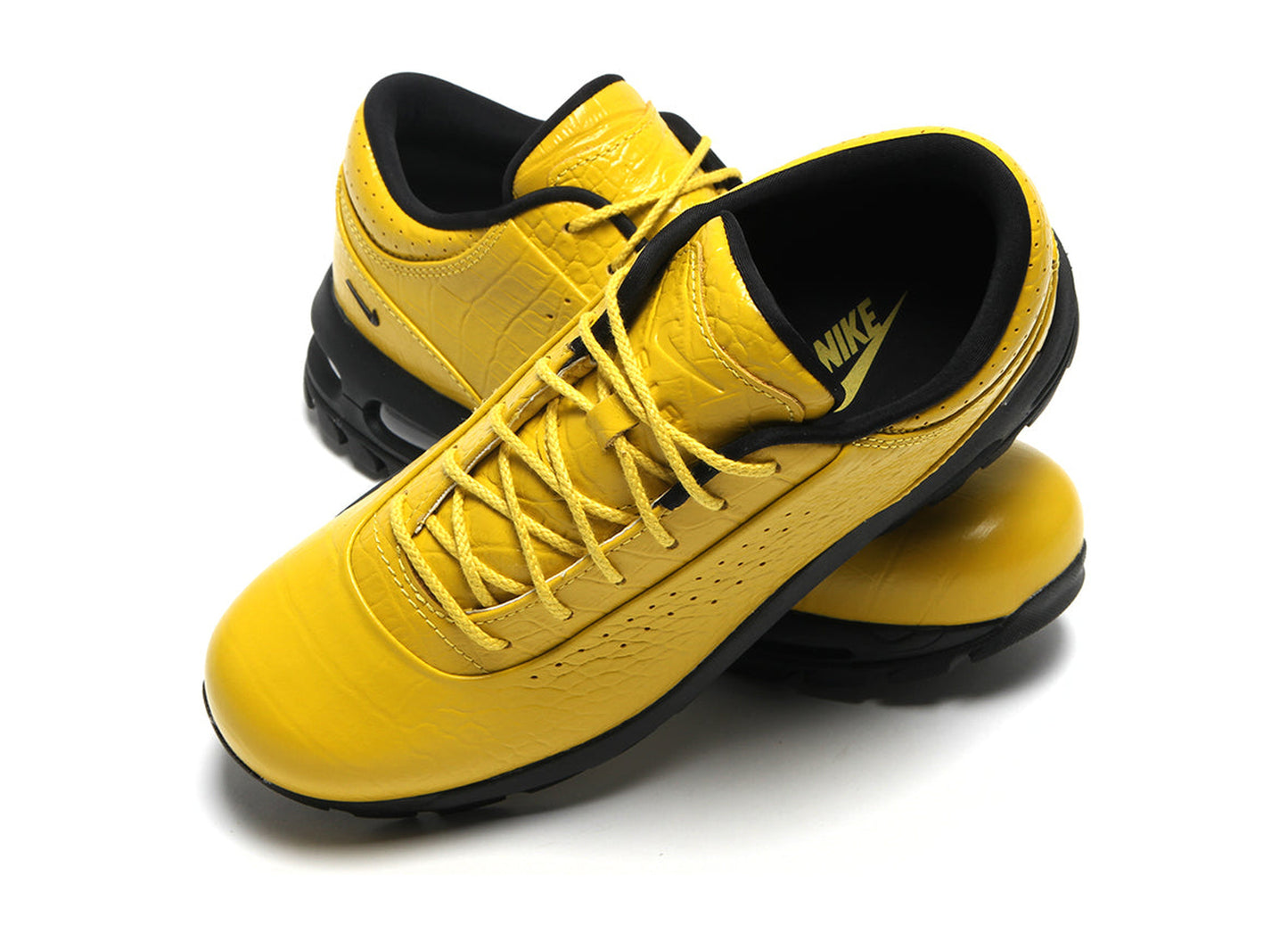 Nike Air Max Goadome Low IV4517-700 in Vivid Sulfur / Black — top angle pair
