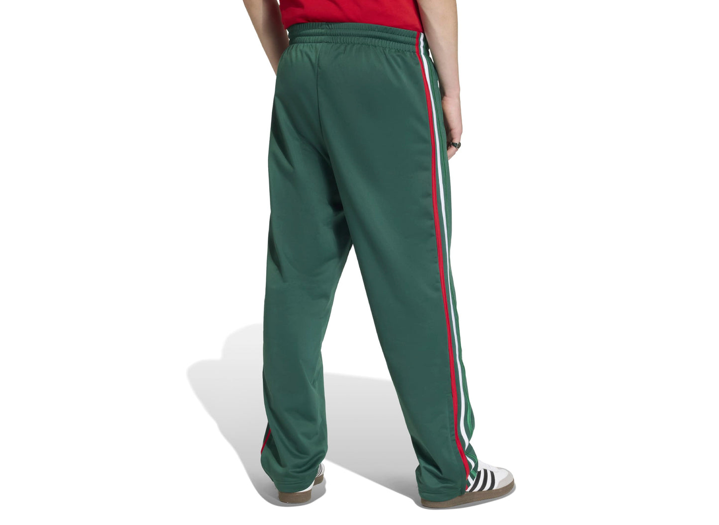 Pantalón deportivo Adidas Firebird en «Team Dark Green»
