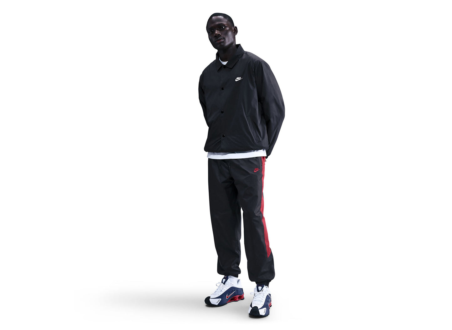 Nike Windrunner gefütterte Hose in Schwarz / Team Crimson