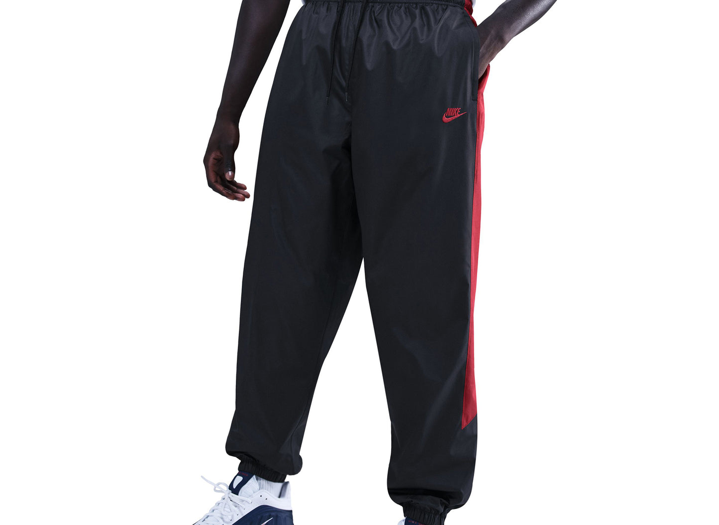 Nike Windrunner gefütterte Hose in Schwarz / Team Crimson