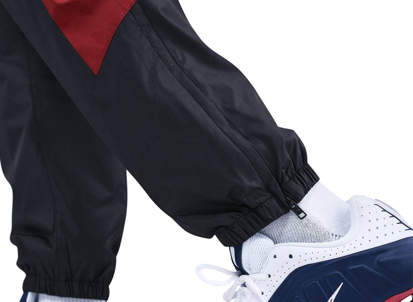 Nike Windrunner gefütterte Hose in Schwarz / Team Crimson