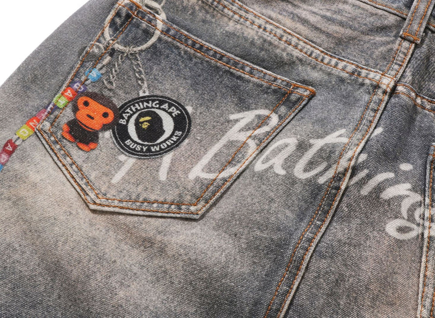 Women's A Bathing Ape Fake Print Multi Logo Denim Skirt in Indigo