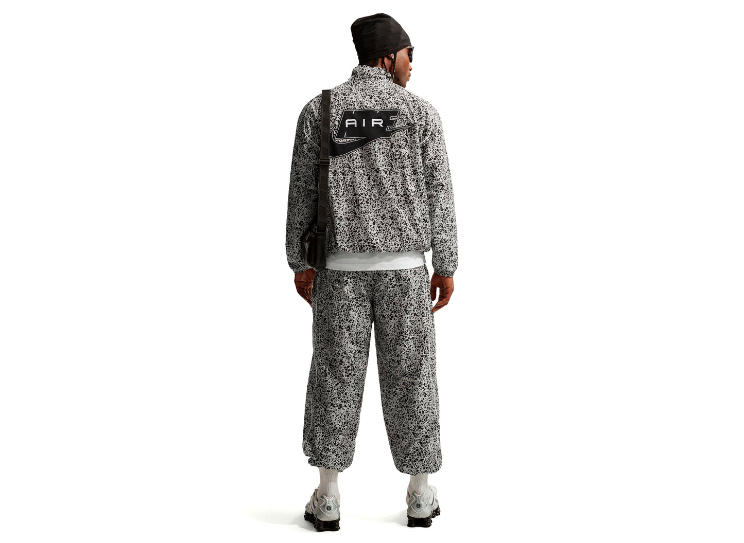 Pantalones Nike Air Woven en hueso claro