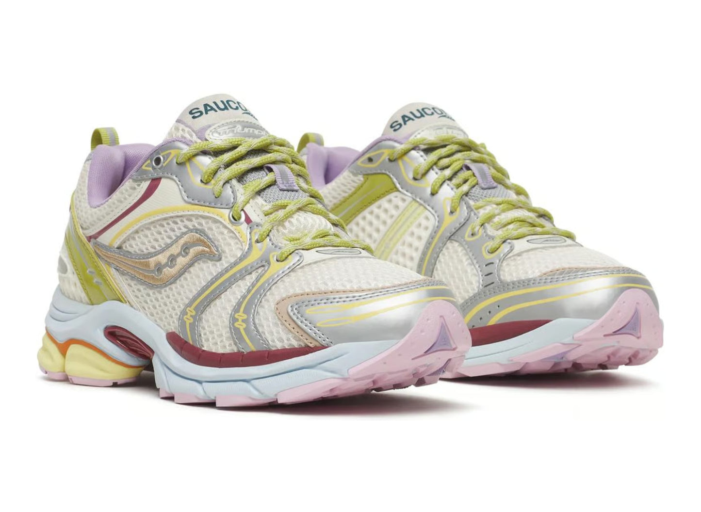 Saucony x Evelynn World ProGrid Triumph 4 Mom Shoe in White / Yellow / Silver, three-quarter view of pair on white