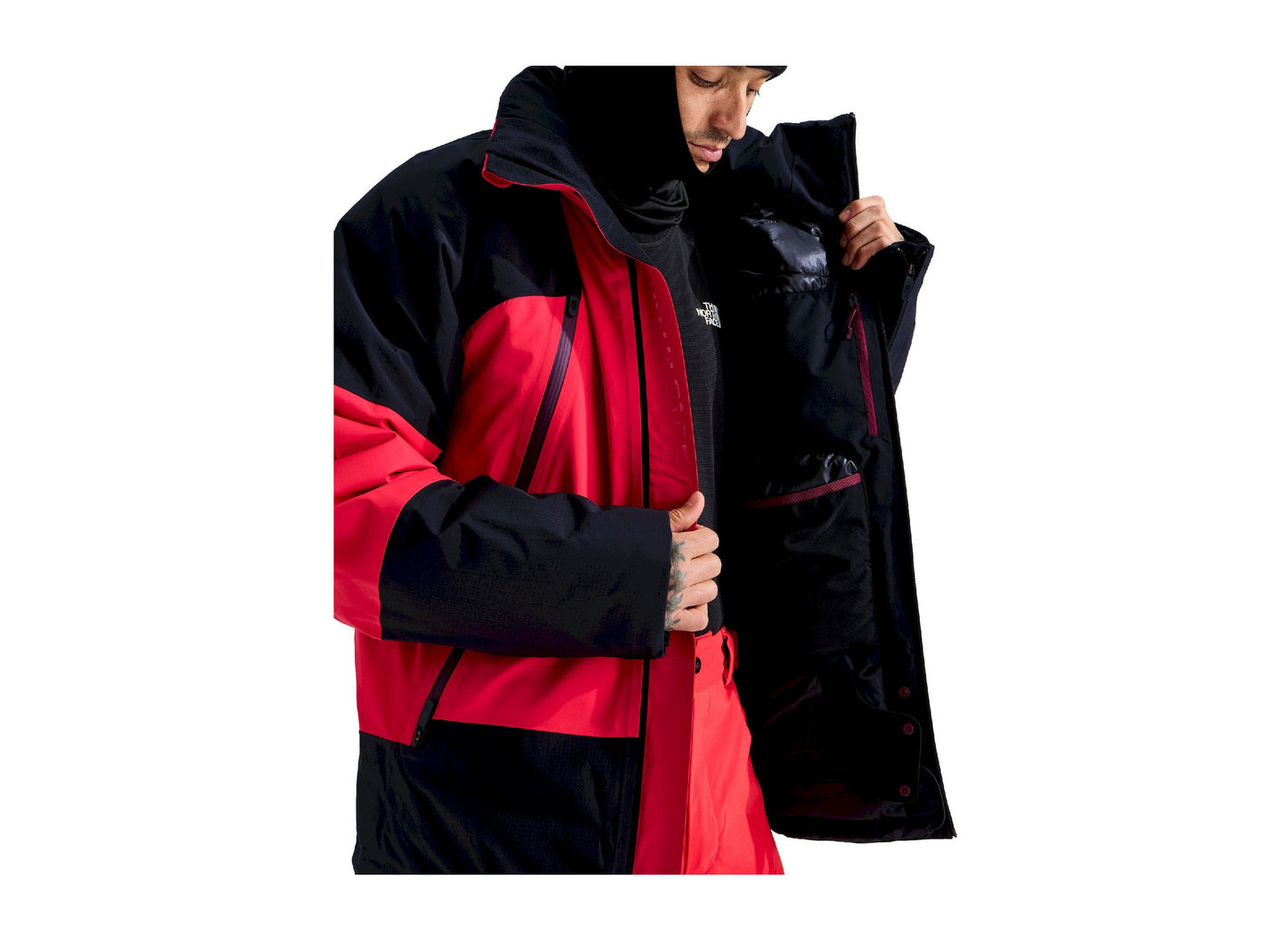 The North Face Snowsquall Jacket in Elevation Red / TNF Black, front zipper detail worn by a model