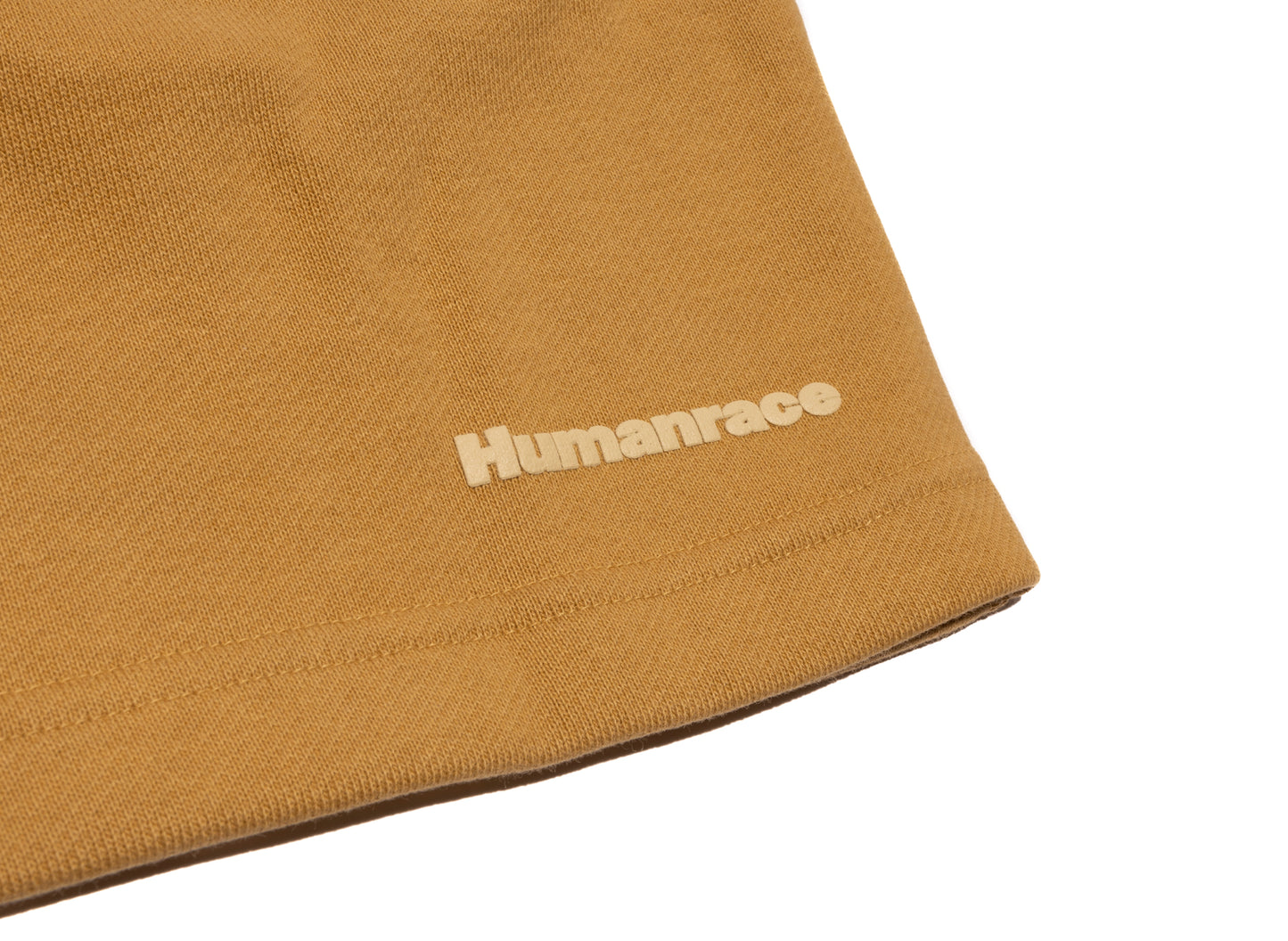 Pantalones cortos Adidas Pharrell Williams Basics en dorado