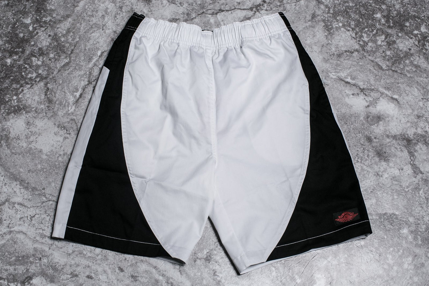 Jordan Tier Zero Blue Label Muscle Shorts, back view laid flat